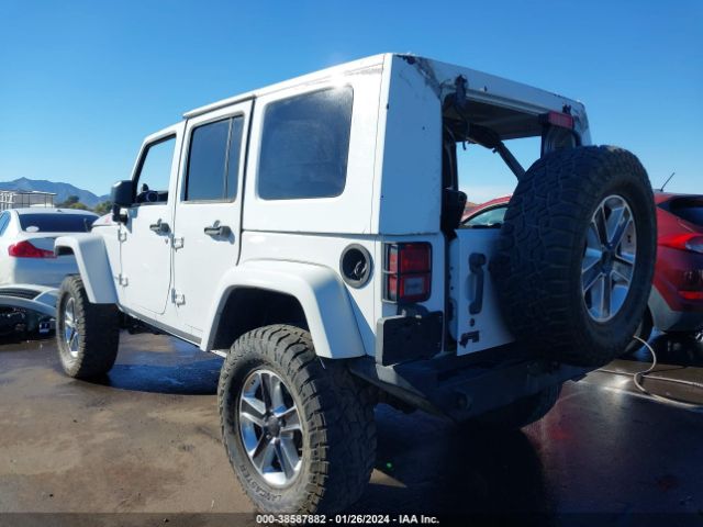 Photo 2 VIN: 1C4BJWFG9DL516892 - JEEP WRANGLER UNLIMITED 