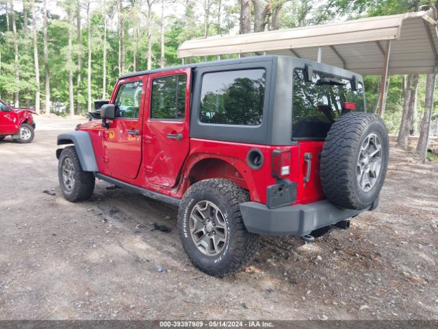 Photo 2 VIN: 1C4BJWFG9EL101945 - JEEP WRANGLER UNLIMITED 