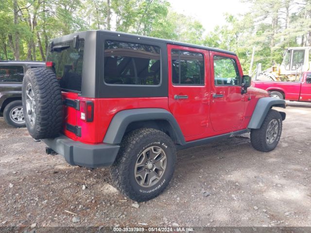 Photo 3 VIN: 1C4BJWFG9EL101945 - JEEP WRANGLER UNLIMITED 