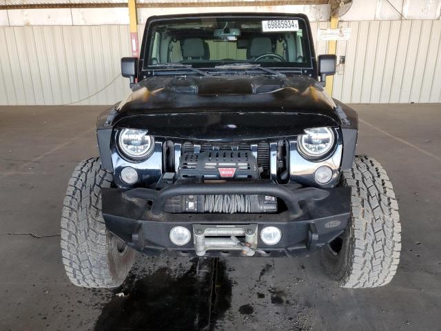 Photo 4 VIN: 1C4BJWFG9EL144620 - JEEP WRANGLER U 