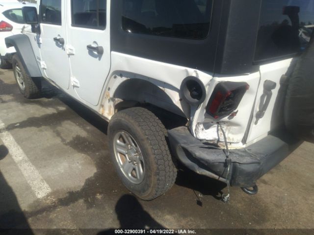 Photo 5 VIN: 1C4BJWKG7EL310929 - JEEP WRANGLER UNLIMITED 