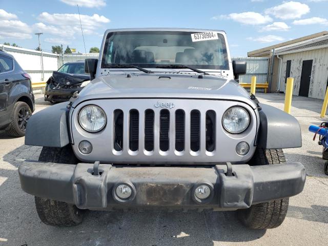 Photo 4 VIN: 1C4GJWAG2GL346263 - JEEP WRANGLER S 