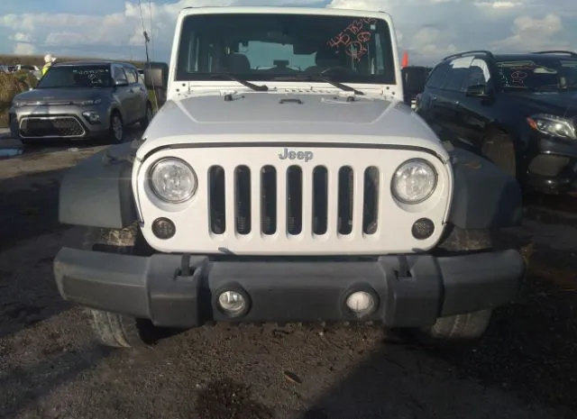 Photo 5 VIN: 1C4GJWAG3JL929089 - JEEP WRANGLER JK 