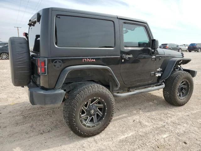 Photo 2 VIN: 1C4GJWAG4EL217857 - JEEP WRANGLER S 