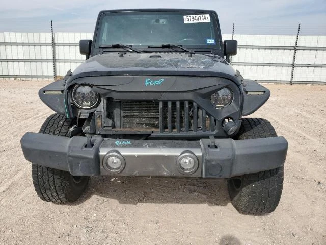 Photo 4 VIN: 1C4GJWAG4EL217857 - JEEP WRANGLER S 