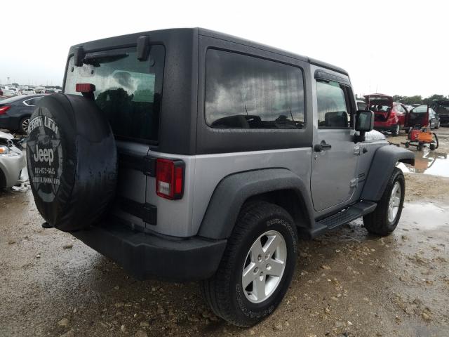 Photo 3 VIN: 1C4GJWAG5EL320432 - JEEP WRANGLER S 