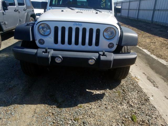 Photo 8 VIN: 1C4GJWAG7JL929354 - JEEP WRANGLER S 