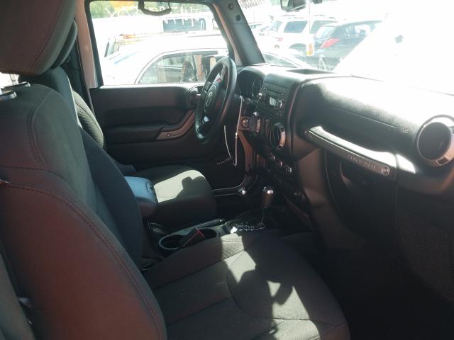 Photo 4 VIN: 1C4GJWAG8HL715998 - JEEP WRANGLER S 