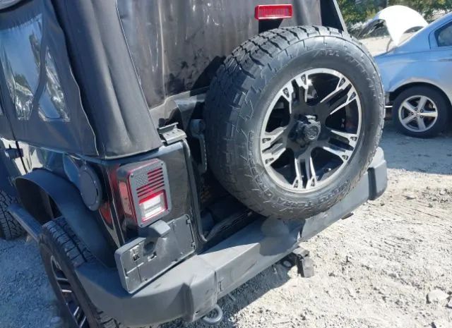 Photo 5 VIN: 1C4GJWAG9EL134859 - JEEP WRANGLER 