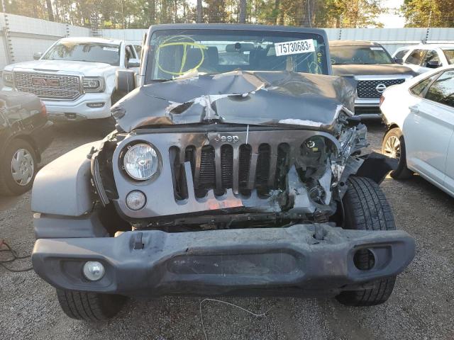 Photo 4 VIN: 1C4GJWAG9HL601055 - JEEP WRANGLER S 