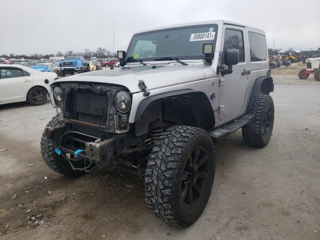 Photo 1 VIN: 1C4GJWBG4CL167697 - JEEP WRANGLER S 