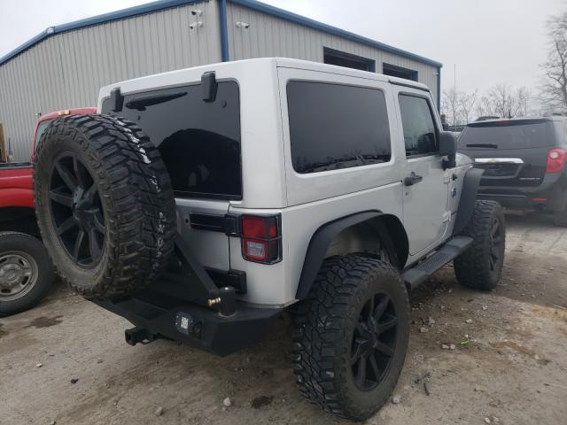 Photo 3 VIN: 1C4GJWBG4CL167697 - JEEP WRANGLER S 