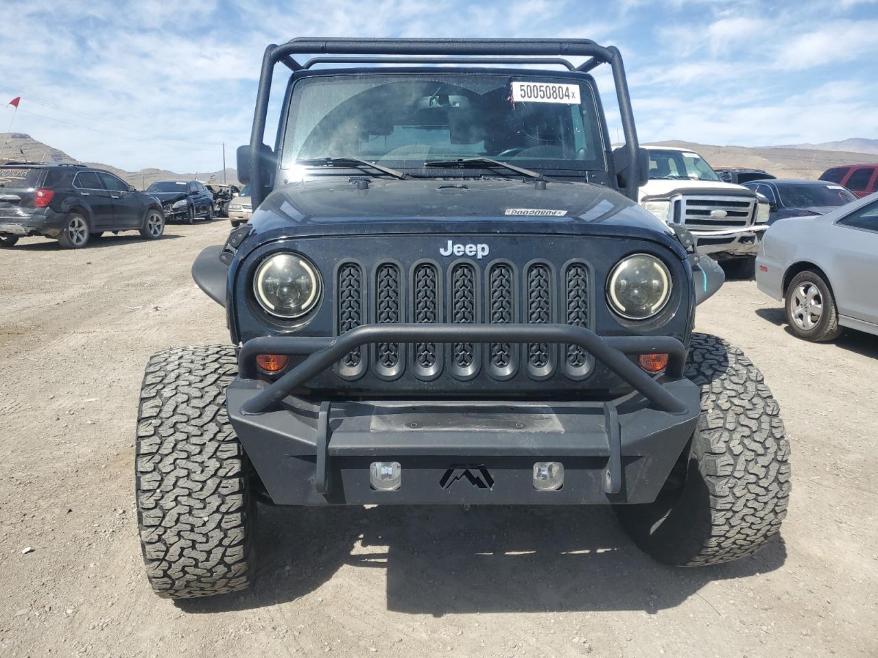 Photo 4 VIN: 1C4GJWBG5DL567835 - JEEP WRANGLER 