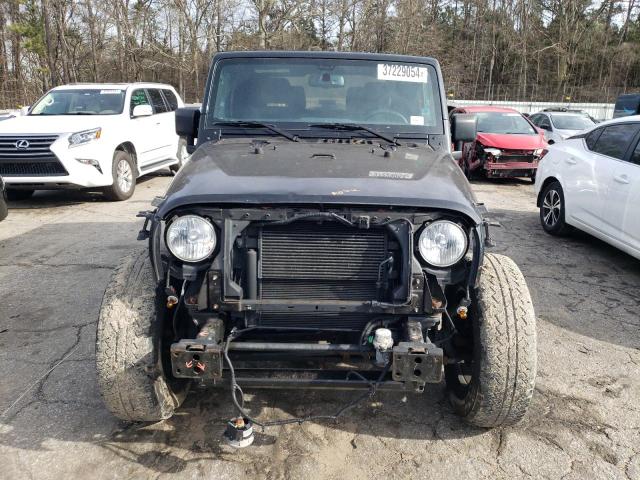 Photo 4 VIN: 1C4GJWBG8GL213117 - JEEP WRANGLER 