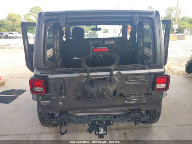 Photo 5 VIN: 1C4GJXAG2KW652599 - JEEP WRANGLER 