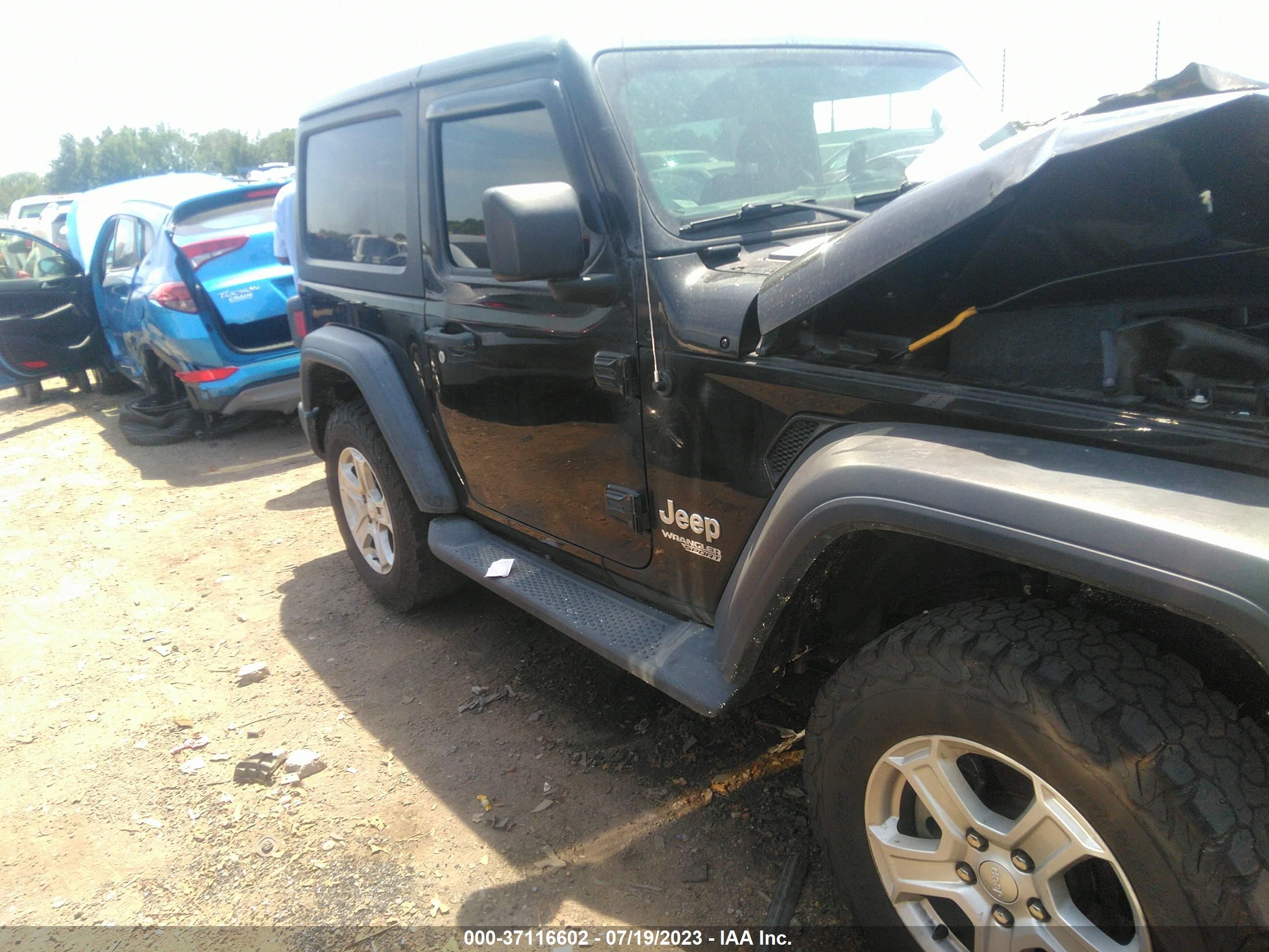 Photo 12 VIN: 1C4GJXAG4JW276602 - JEEP WRANGLER 