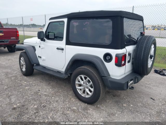 Photo 2 VIN: 1C4GJXAN0PW658939 - JEEP WRANGLER 