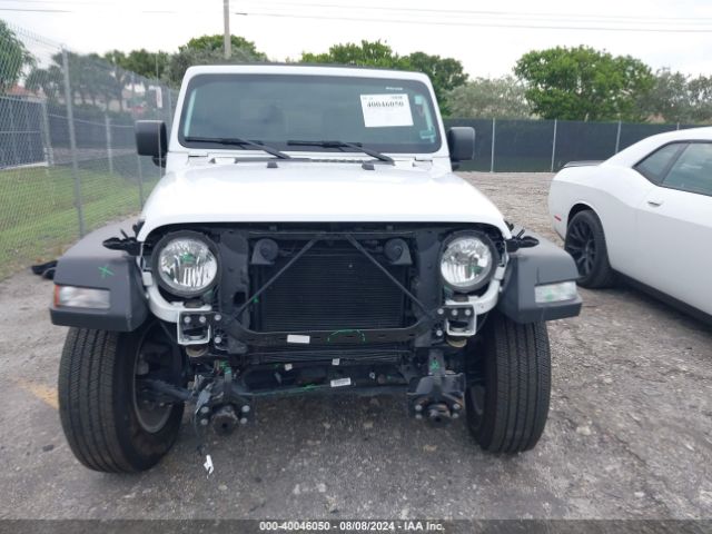 Photo 5 VIN: 1C4GJXAN0PW658939 - JEEP WRANGLER 