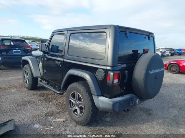 Photo 2 VIN: 1C4GJXAN4KW504873 - JEEP WRANGLER 