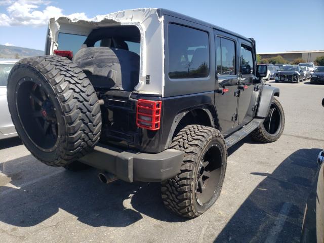 Photo 3 VIN: 1C4HJWDG0EL313923 - JEEP WRANGLER U 