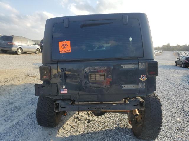 Photo 5 VIN: 1C4HJWDG0GL233590 - JEEP WRANGLER U 