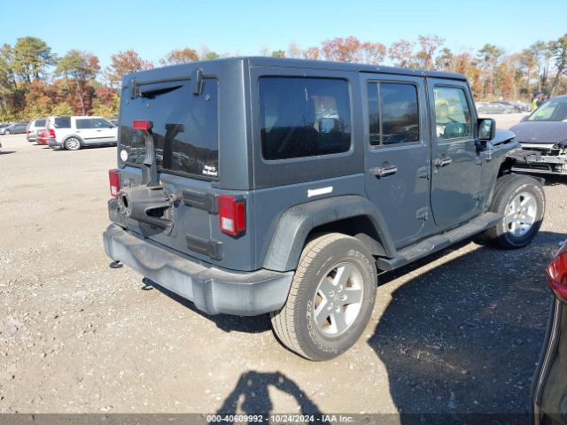 Photo 3 VIN: 1C4HJWDG0GL326464 - JEEP WRANGLER 