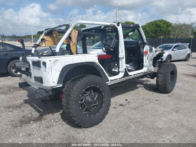 Photo 3 VIN: 1C4HJWDG0JL930443 - JEEP WRANGLER JK 