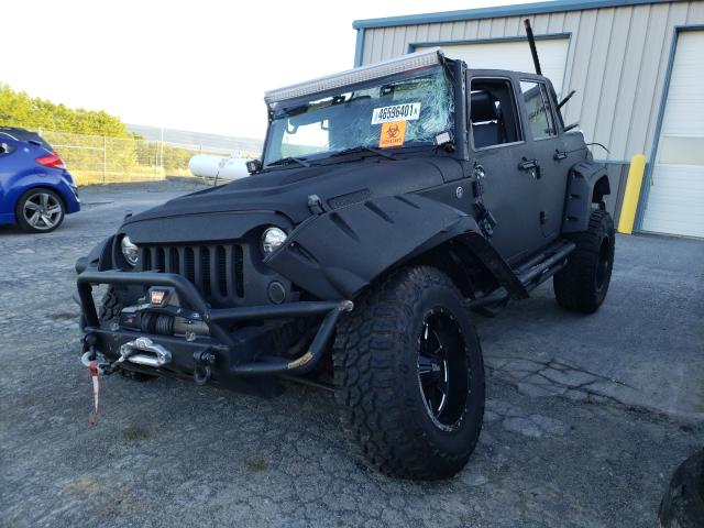 Photo 1 VIN: 1C4HJWDG1EL132880 - JEEP WRANGLER U 