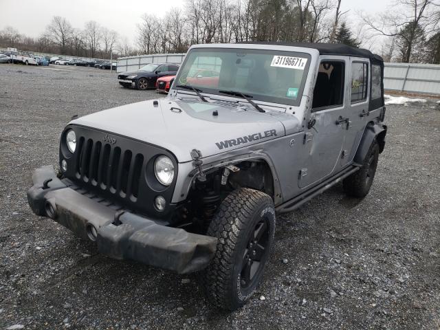 Photo 1 VIN: 1C4HJWDG1GL128380 - JEEP WRANGLER U 