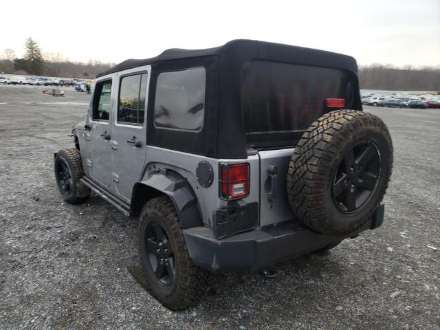 Photo 2 VIN: 1C4HJWDG1GL128380 - JEEP WRANGLER U 