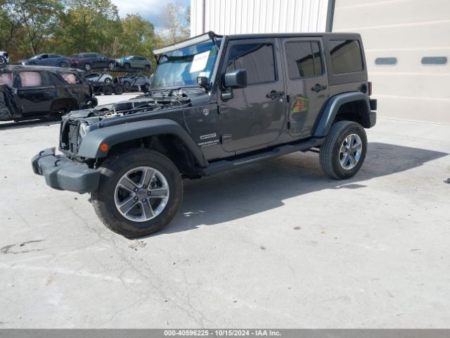 Photo 1 VIN: 1C4HJWDG1GL311391 - JEEP WRANGLER 