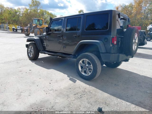 Photo 2 VIN: 1C4HJWDG1GL311391 - JEEP WRANGLER 