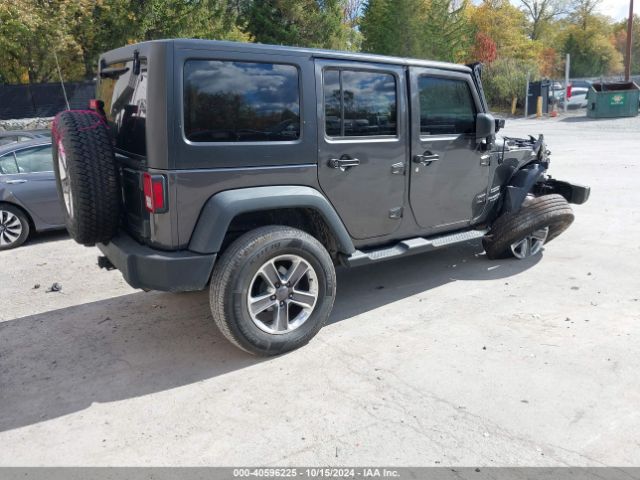 Photo 3 VIN: 1C4HJWDG1GL311391 - JEEP WRANGLER 