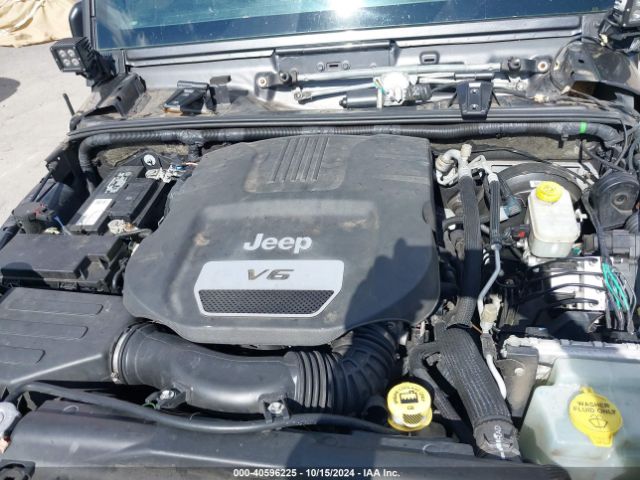 Photo 9 VIN: 1C4HJWDG1GL311391 - JEEP WRANGLER 