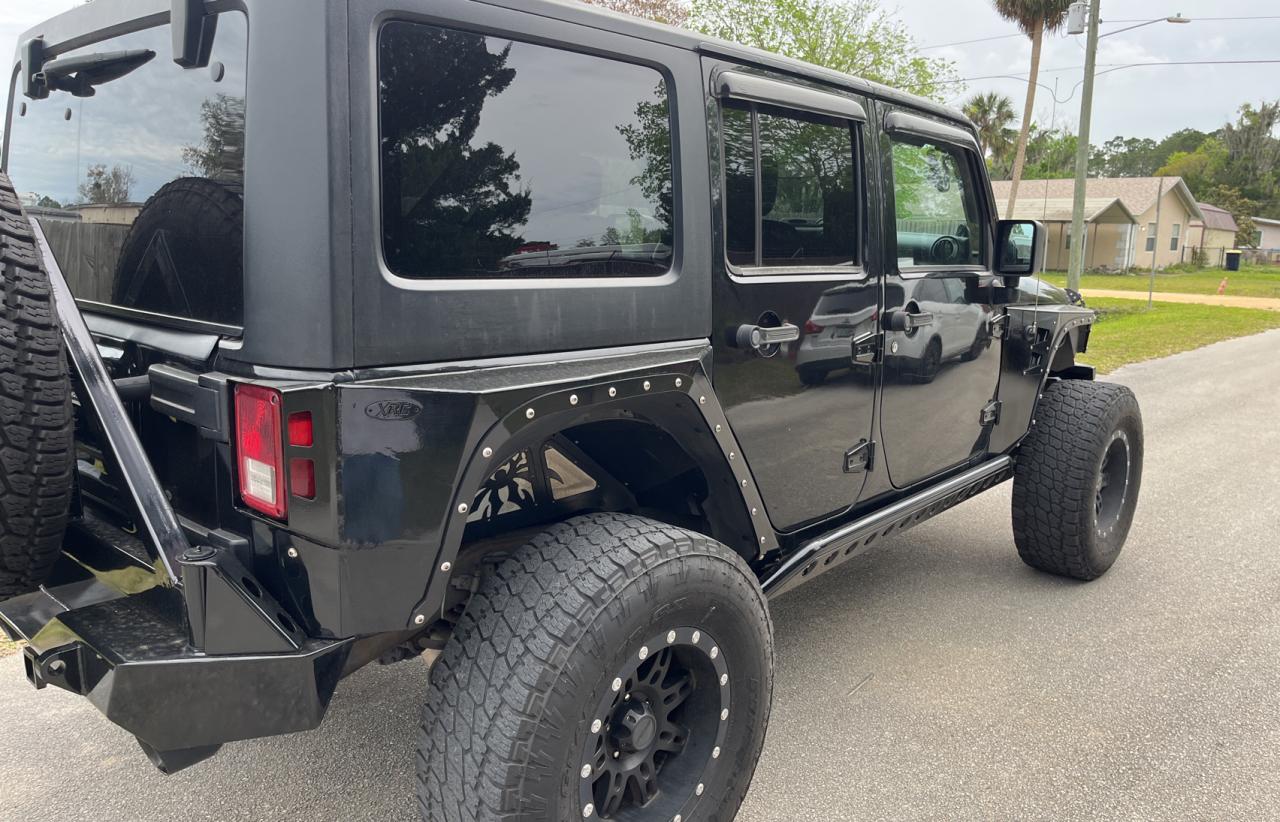 Photo 3 VIN: 1C4HJWDG2CL129757 - JEEP WRANGLER 