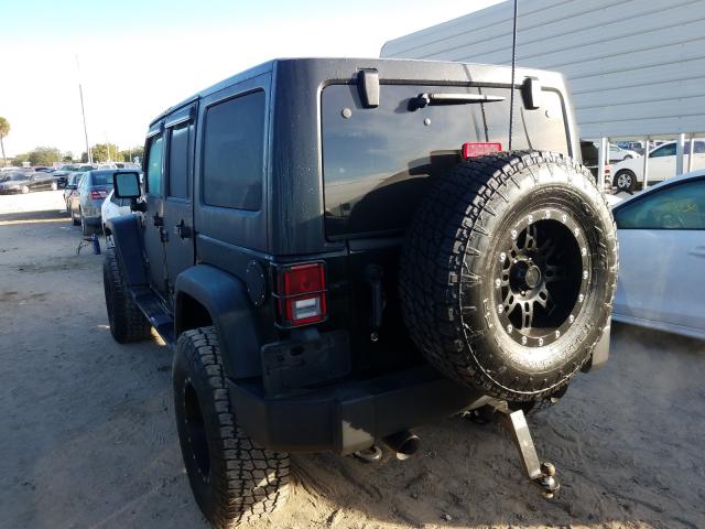 Photo 2 VIN: 1C4HJWDG2CL129757 - JEEP WRANGLER 