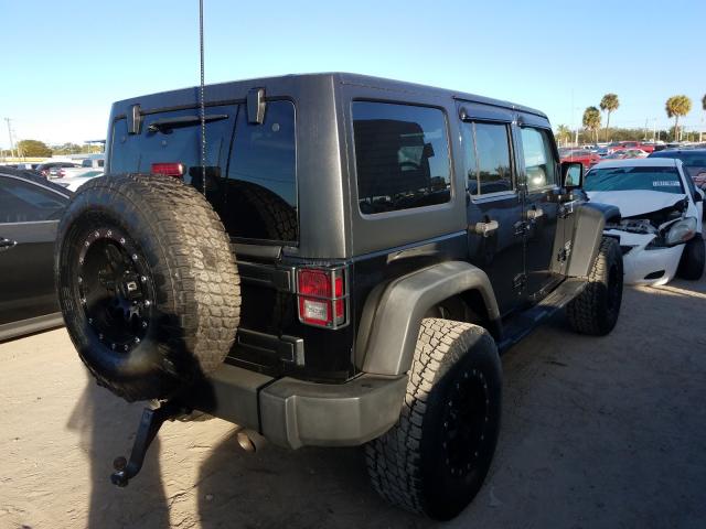 Photo 3 VIN: 1C4HJWDG2CL129757 - JEEP WRANGLER 