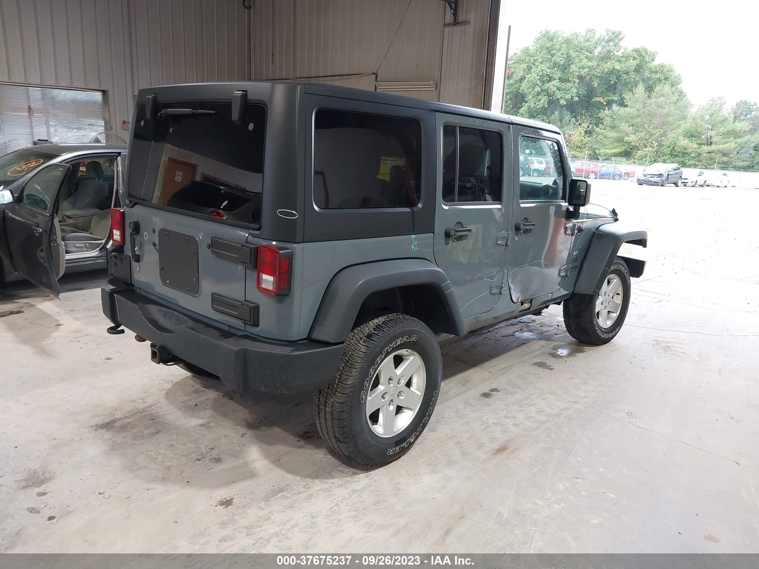 Photo 3 VIN: 1C4HJWDG2EL187516 - JEEP WRANGLER 