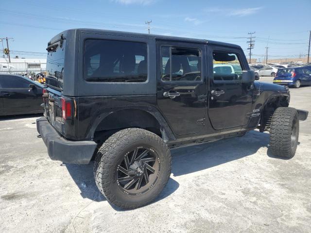 Photo 2 VIN: 1C4HJWDG2JL877776 - JEEP WRANGLER U 