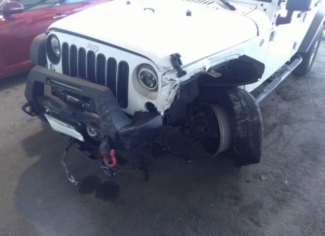 Photo 5 VIN: 1C4HJWDG2JL921887 - JEEP WRANGLER UNLIMITED 