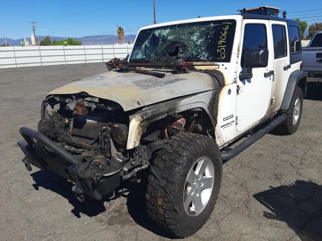 Photo 1 VIN: 1C4HJWDG3EL223777 - JEEP WRANGLER U 