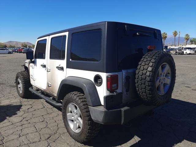 Photo 2 VIN: 1C4HJWDG3EL223777 - JEEP WRANGLER U 