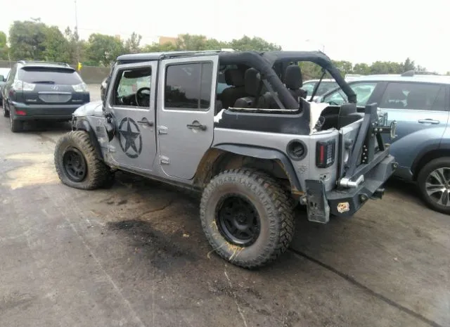 Photo 2 VIN: 1C4HJWDG3EL308506 - JEEP WRANGLER UNLIMITED 