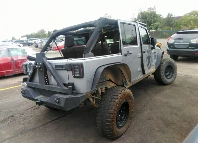 Photo 3 VIN: 1C4HJWDG3EL308506 - JEEP WRANGLER UNLIMITED 