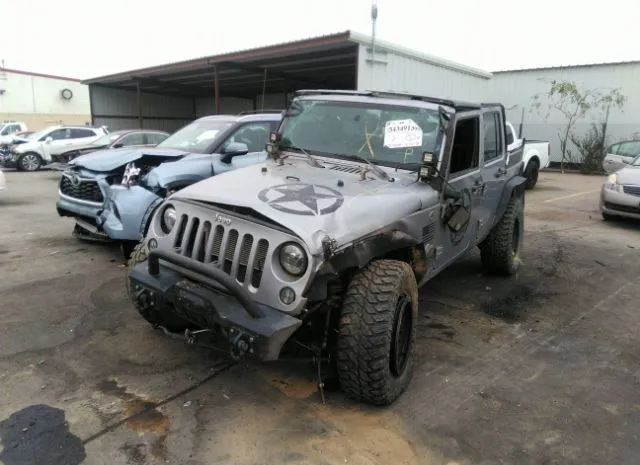 Photo 5 VIN: 1C4HJWDG3EL308506 - JEEP WRANGLER UNLIMITED 