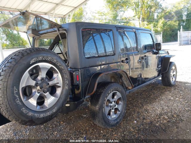 Photo 3 VIN: 1C4HJWDG3GL234622 - JEEP WRANGLER 