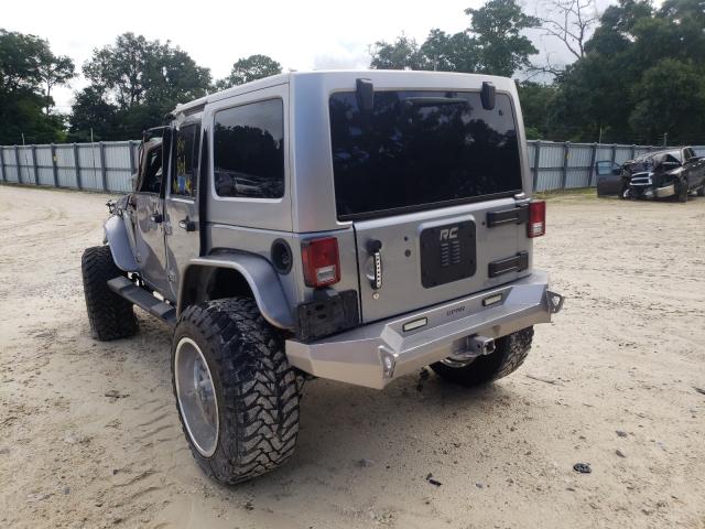 Photo 2 VIN: 1C4HJWDG4DL697249 - JEEP WRANGLER U 