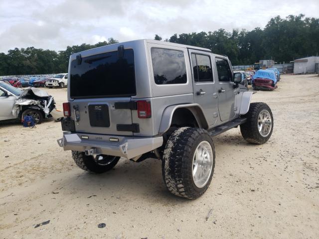 Photo 3 VIN: 1C4HJWDG4DL697249 - JEEP WRANGLER U 