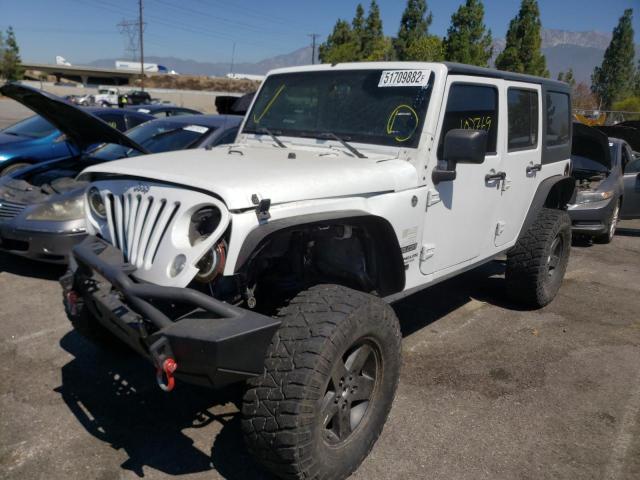 Photo 1 VIN: 1C4HJWDG4EL197710 - JEEP WRANGLER U 