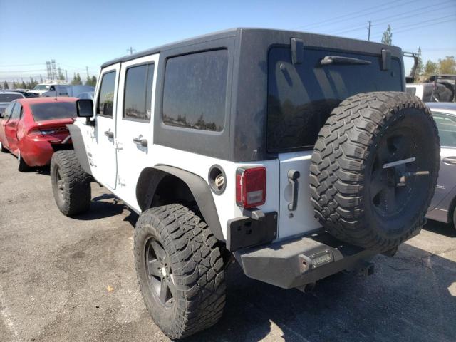 Photo 2 VIN: 1C4HJWDG4EL197710 - JEEP WRANGLER U 